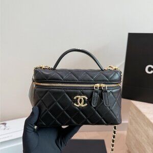 CHANEL Black Quilted Vanity Bag with Gold Hardware